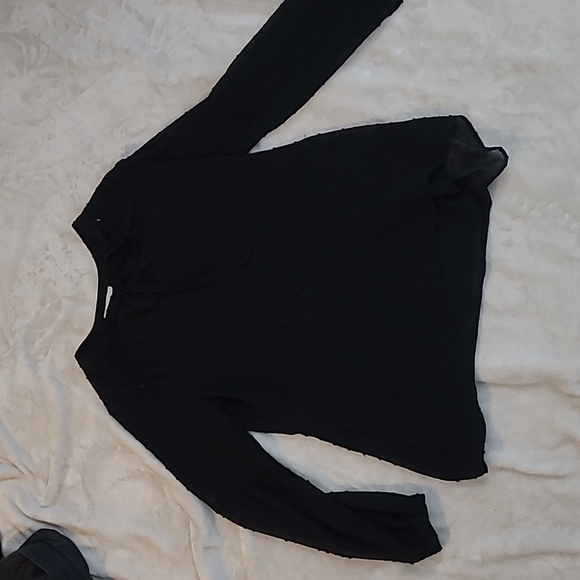 Black Bow Tie Blouse with Polka Sitting and Ruffled Hem - Picture 4 of 6